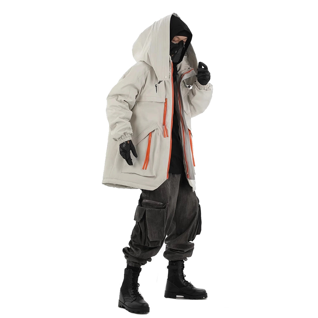 Male model wearing insulated winter jacket with high neck hood and tactical design, suitable for winter survival.